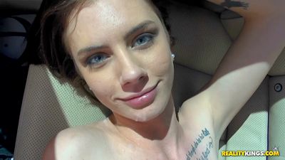 Red-haired babe enjoys fucking in the car