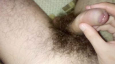 I jerk off my penis and cum on my stomach under the blanket