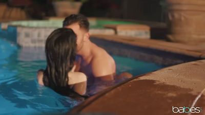 Sexy brunette fucks before bed in the pool