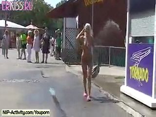 A hot blonde walks naked down the street and pleases all the guys