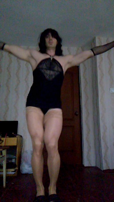 Erotic dance of a trance in stockings and dress