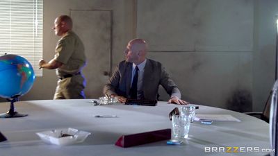 Busty bitch fucks with the commander in the meeting room